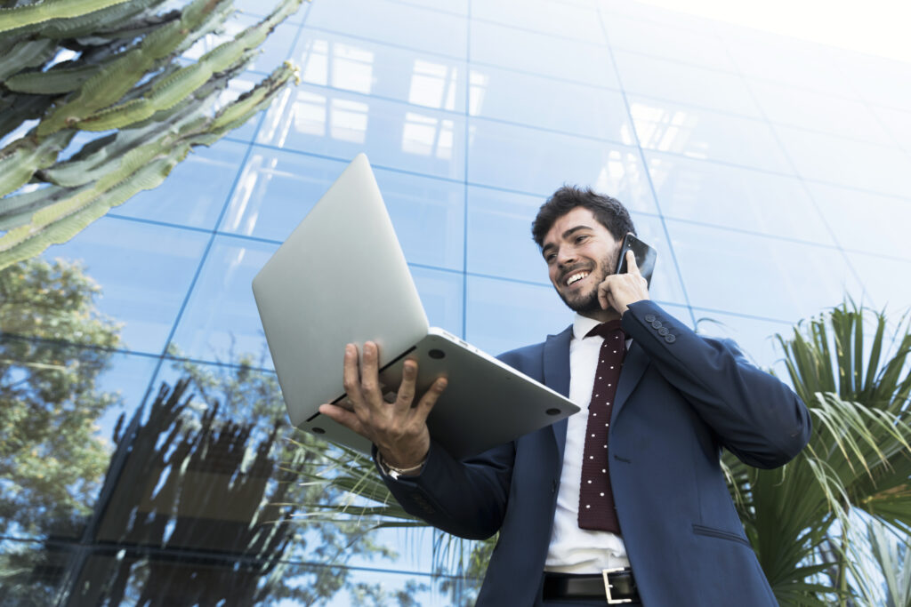 low angle lawyer looking his laptop